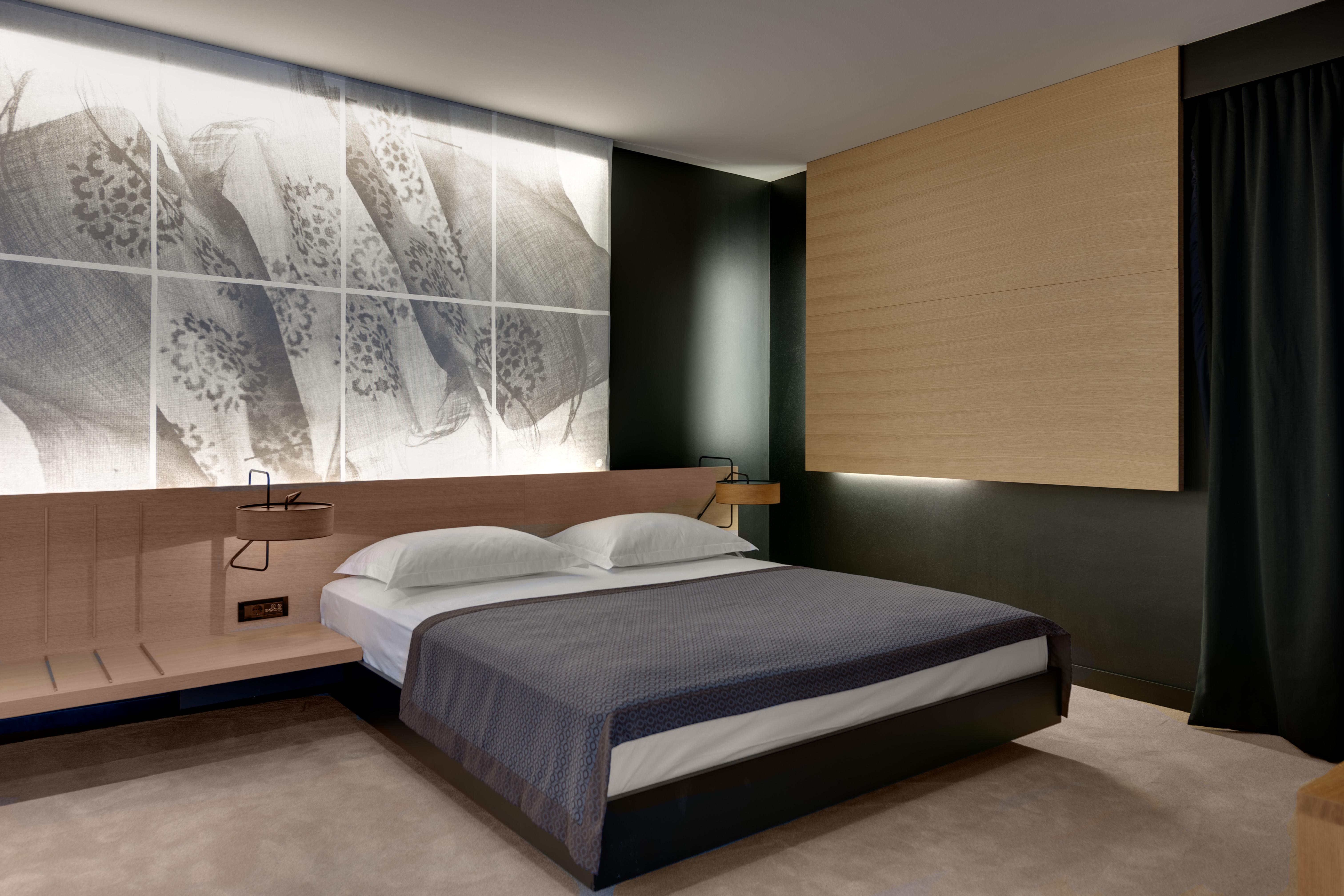 ホテル ローン ロヴィニ エクステリア 写真 A bedroom
